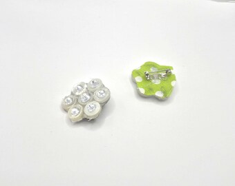 Hexagon brooches made from buttons