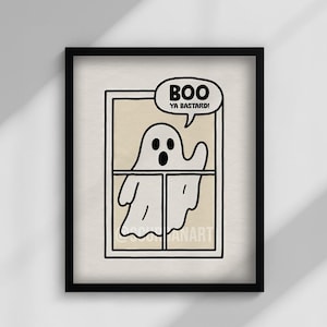 Könnte beinhalten: Gerahmter Kunstdruck mit einem Cartoon-Geist in einem Fenster, mit dem Text "BOO ya bastard!" in einer Sprechblase. Das Kunstwerk ist in Schwarzweiß gehalten, mit beigem Hintergrund und schwarzem Rahmen. Der Text "FRAMED OPTIONS" steht unten.
