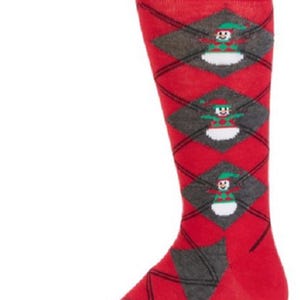 May include: Red Christmas sock featuring a repeating argyle pattern of grey diamonds and small elf figures. The sock has a red cuff, heel, and toe. The elf figures have green hats and red and white outfits.