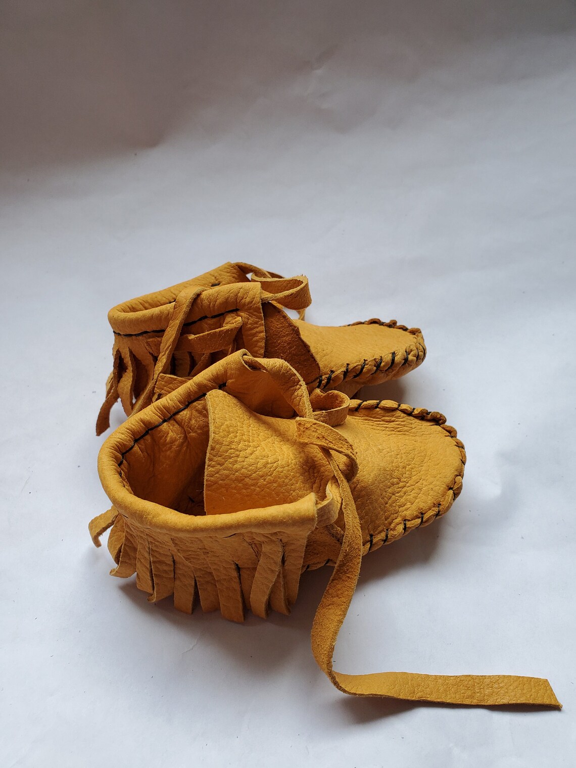 making moccasins from deer hide