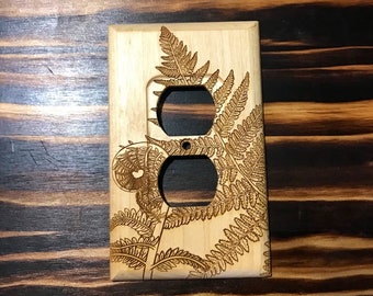 Wooden fern outlet cover