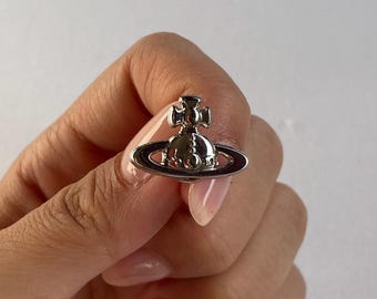 Pin de esmalte 3D con orbe espacial de Saturno