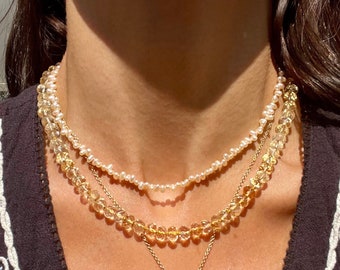 Collar de caramelo con gema de citrino color melocotón y luz de cristal
