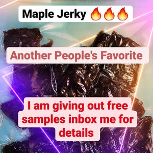 May include: Close-up of maple flavored beef jerky. The jerky is dark brown and has a glossy finish. The text "Maple Jerky" is written in white letters with three fire emojis. The text "Another People's Favorite" is written in white letters. The text "I am giving out free samples inbox me for details" is written in white letters.
