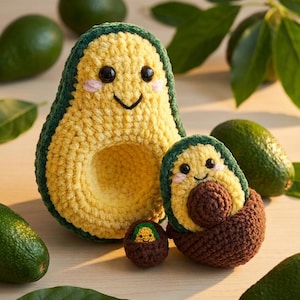 May include: A collection of crocheted avocado toys with smiling faces. The large avocado is yellow with a green border, and the smaller ones are brown and green. Fresh avocados and green leaves are scattered around the toys.