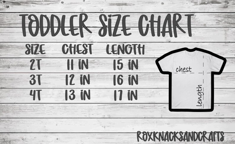 May include: A toddler size chart with measurements in inches for chest and length. The chart shows sizes 2T, 3T, and 4T. The chart is on a white wood background.