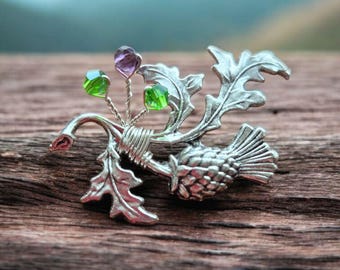 Silver and crystal thistle brooch
