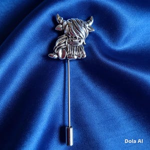 Spilla a forma di mucca delle Highlands color argento
