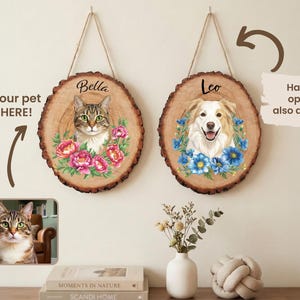 May include: Two personalized pet portraits on wood slices. One features a cat named Bella surrounded by pink flowers, the other a dog named Leo with blue flowers. Both are hanging with twine. The text "Your pet HERE!" is also visible.