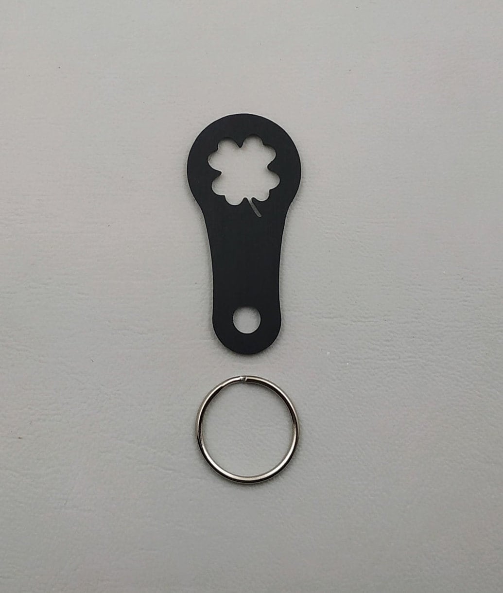 Cloverleaf shopping cart releaser, shopping cart chip, keyring removable lasered