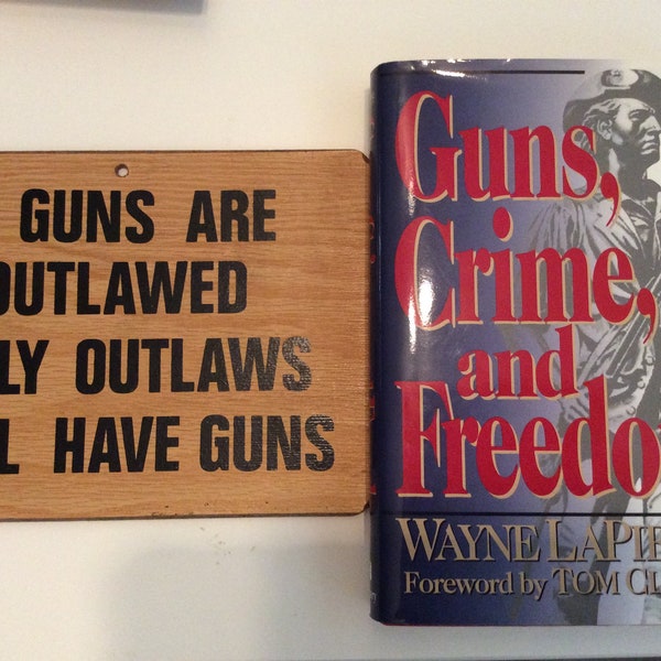 If Guns are Outlawed-sign and Guns, Crime, and Freedom book