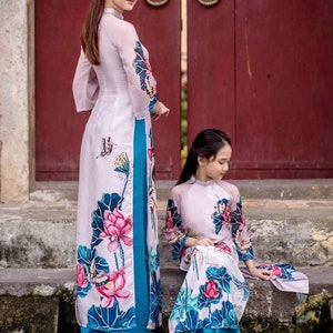 Women and kid ao dai- mother daughter matching Vietnamese traditional dress