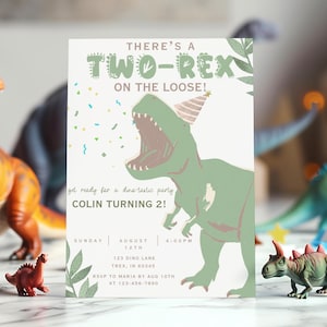 May include: A birthday party invitation with a green dinosaur illustration wearing a party hat. The text reads "THERE'S A TWO-REX ON THE LOOSE!" and "COLIN TURNING 2!" with party details. The invitation is decorated with confetti and leaf accents.