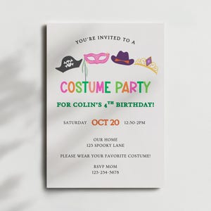 May include: A white invitation card with the text "YOU'RE INVITED TO A COSTUME PARTY FOR COLIN'S 4TH BIRTHDAY!" and the date "OCT 20". The card features illustrations of a pirate hat, mask, hat, and crown.