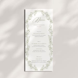 May include: A baptism menu card with a floral border. The menu includes starters, main courses, and dessert. The menu is for Andrew's Baptism on 04-15-03.