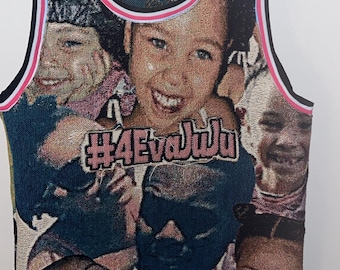 May include: A woven basketball jersey featuring a collage of smiling faces. The jersey has a black base with pink and white trim. The text "#4EvaJuJu" is displayed prominently on the front.