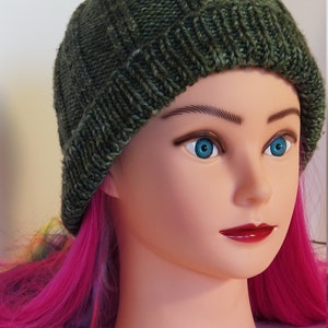Green wool knitted winter hat
