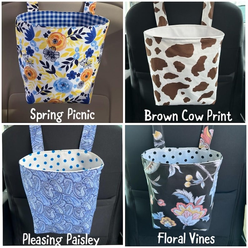 May include: Four car trash bags with different patterns. One has a blue and white gingham lining and a floral design. Another has a brown cow print. The third has a blue paisley pattern. The last has a floral vines pattern. Each bag has straps.