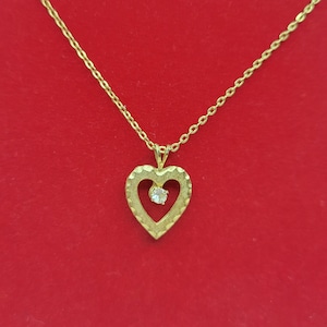 Collana vintage con ciondolo a forma di cuore in oro con ciondolo a forma di cuore aperto