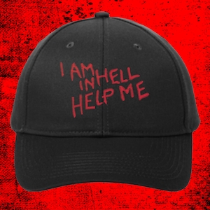 May include: Black baseball cap with red embroidered text that reads "I AM IN HELL HELP ME".