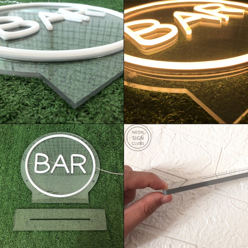May include: A clear acrylic neon sign with the word "BAR" in white neon. The sign is circular with a white border and sits on a clear base. The sign is designed for indoor use and is ideal for a home bar or business.