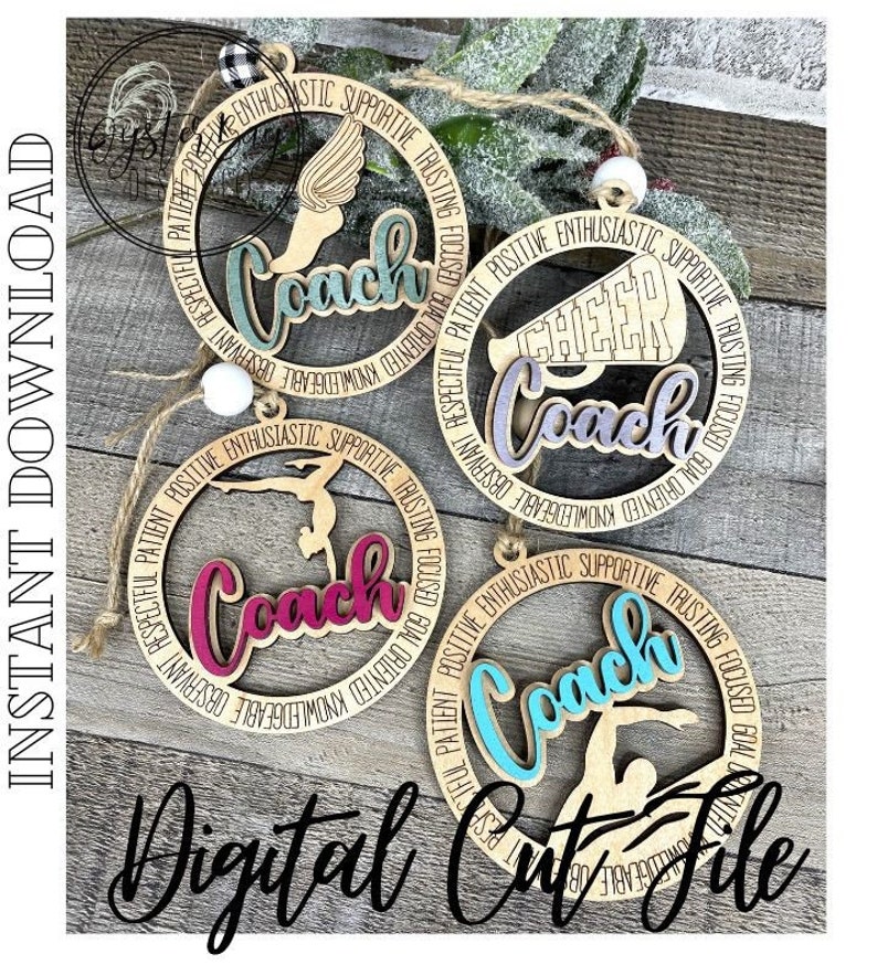 May include: Four wooden coach ornaments featuring sports figures and the word "Coach" in different colours. Each ornament has a circular frame with positive attributes. The text "Digital Cut File" is also visible.