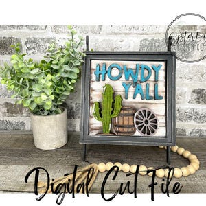 May include: A digital cut file for a wooden sign with the text "Howdy Y'all" in blue letters. The sign is decorated with a green cactus, a barrel, and a wagon wheel.