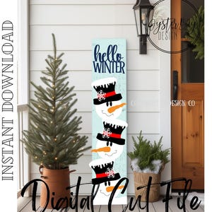 May include: A light blue vertical sign featuring the text "hello WINTER" and three snowmen stacked on top of each other. Each snowman wears a black top hat with a red band and a snowflake. Digital cut file.