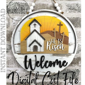 May include: White wooden round sign with a distressed finish. The sign features a church, a sunrise, and the words "He is Risen" with a scripture reference. The sign also includes the word "Welcome" in black lettering.
