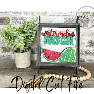 May include: A decorative sign with a watermelon theme. The sign features the words "watermelon PATCH" in red and green, along with a watermelon slice and a whole watermelon. The sign is displayed on a black metal stand. The words "Digital Cut File" are written in black script.