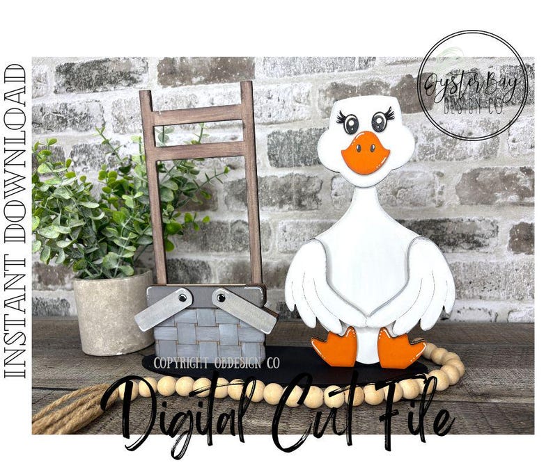 May include: A wooden goose figurine with orange feet and beak, white body, and black eyes. A gray picnic basket, a small wooden ladder, and a potted plant are also present. The words "Instant Download" and "Digital Cut File" are visible.