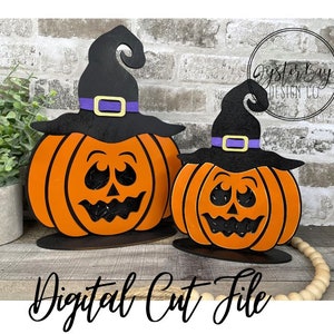 May include: Two orange pumpkin decorations with black witch hats, purple hatbands, and gold buckles. The pumpkins have carved faces and sit on black bases. The words "Instant Download" and "Digital Cut File" are visible.