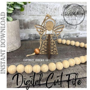 May include: A wooden angel ornament with a halo and wings, suspended by twine. The angel is set against a backdrop of a wooden bead garland and a brick-like surface. The words "Digital Cut File" are written in a script font.