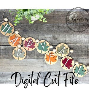 May include: A wooden autumn banner with the word "HAPPY" spelled out on individual leaf-shaped pieces. The leaves are painted in shades of red, orange, yellow, and green. The banner is strung together with twine and white beads.
