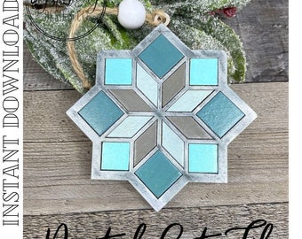 May include: A teal, gray, and white snowflake ornament with a rustic wood background.  The ornament is made of wood and has a distressed finish.  The snowflake is a digital cut file.