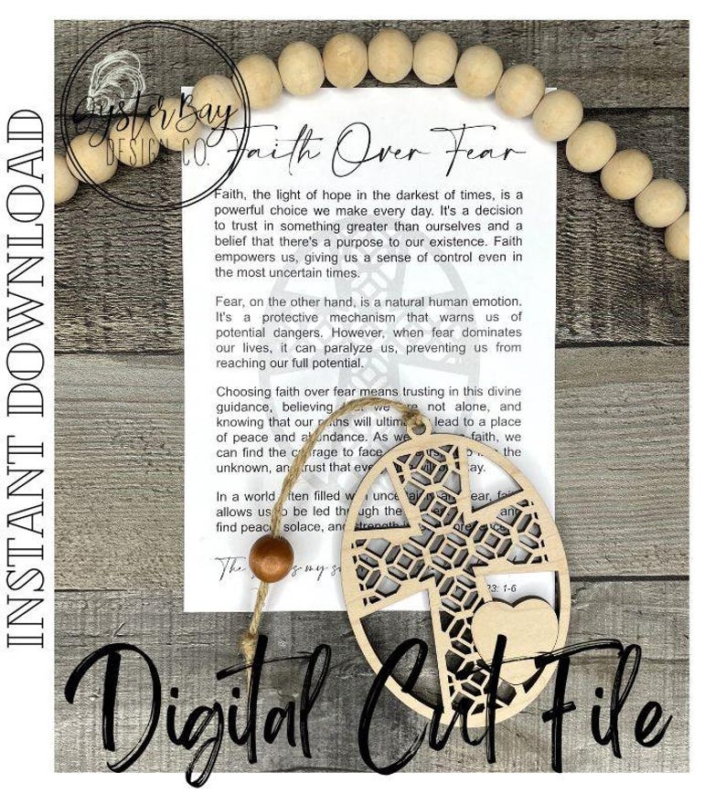 May include: A wooden cutout of a cross with a heart at the bottom. The cutout is surrounded by a circle with a decorative pattern. The cutout is hanging from a string with a wooden bead. The text "Faith Over Fear" is written on a white background with a quote about faith and fear.