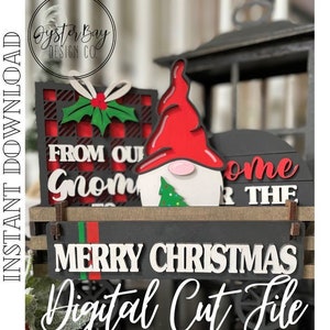 May include: A digital cut file design for a Christmas gnome, a gift box, and a sign that says "From Our Gnome to The Home" and "Merry Christmas".
