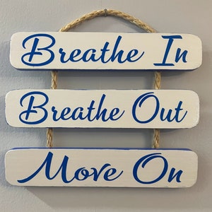 Breathe In, Breathe Out, Move On, Hanging Sign