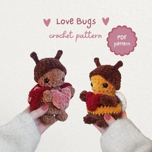 May include: Two crocheted Love Bugs, one brown and red, the other yellow and brown, each holding a heart. The text "Love Bugs crochet pattern" is above the bugs, with a "PDF pattern" tag.
