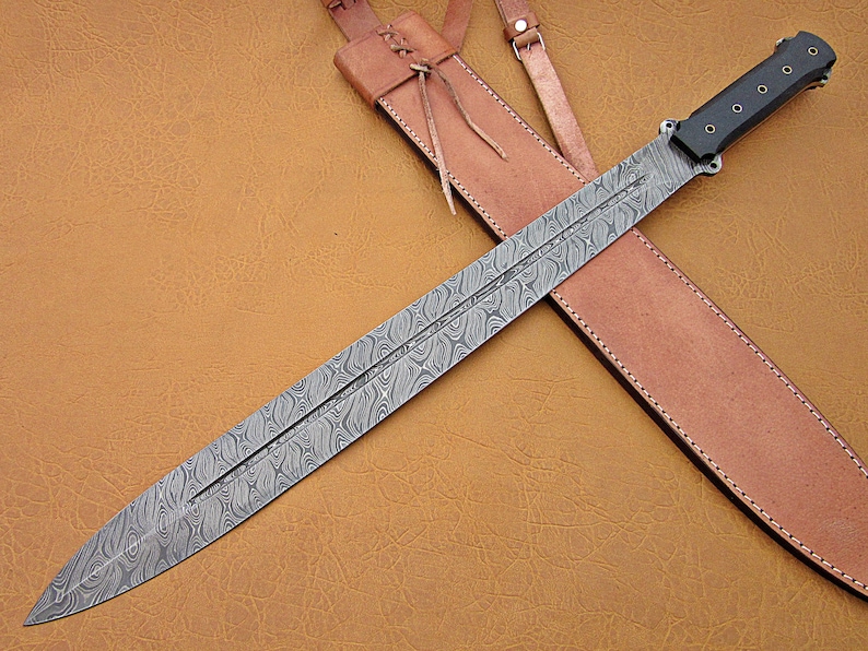 Custom Damascus steel hunting Sword with dollar sheet handle