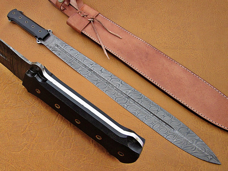 Custom Damascus steel hunting Sword with dollar sheet handle