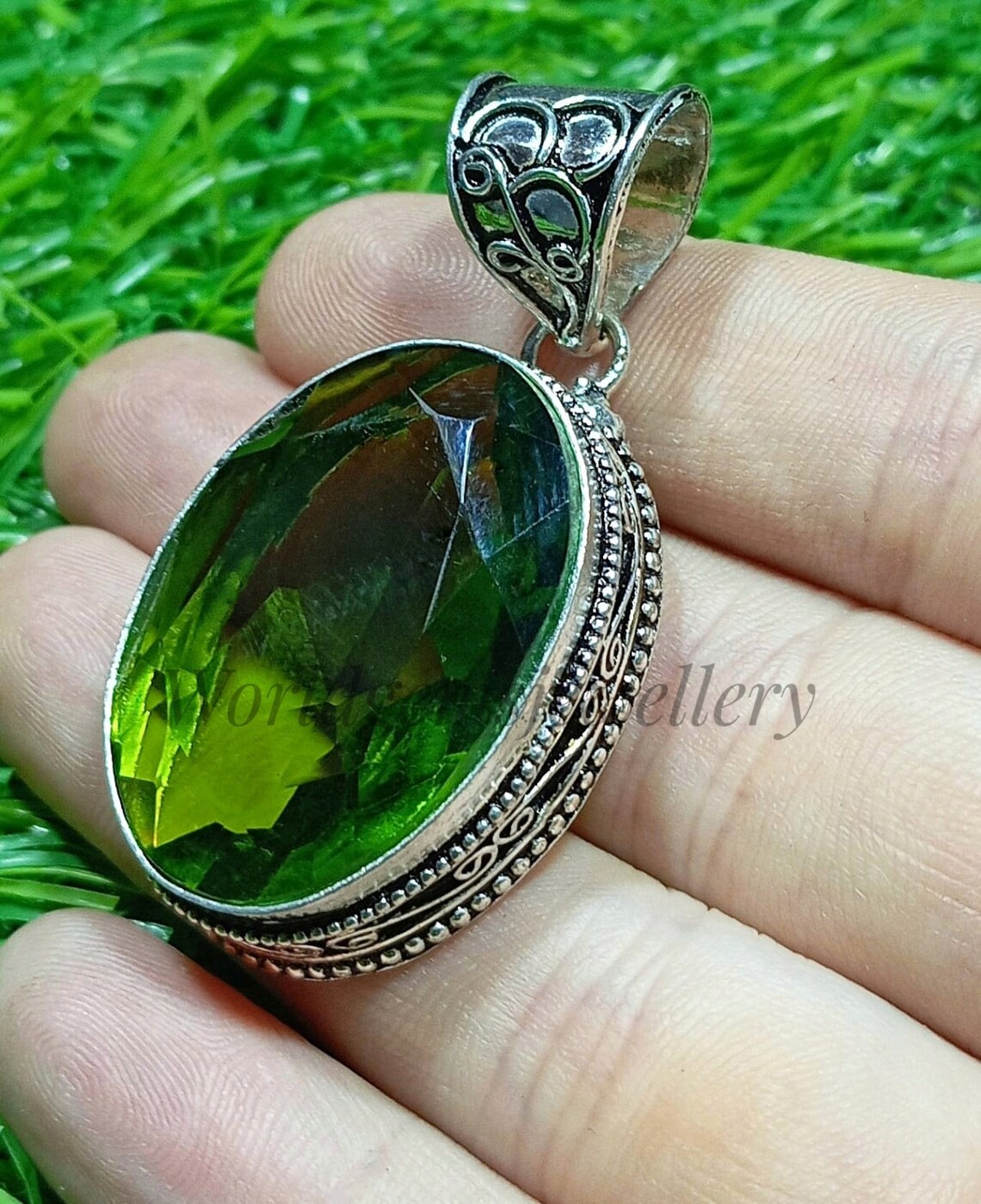 0.64 Carat Genuine Peridot .925 Sterling Silver Pendant