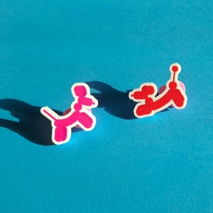 Pair of balloon dog acrylic pins