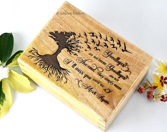 May include: A wooden box with a tree and birds engraved on the lid. The box has the text "Goodbyes are not forever Goodbyes The end they simply mean I'll miss you until we Meet Again" engraved on the lid.
