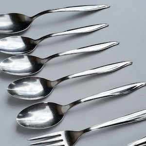 Sears Fashion USA Stainless Flatware Set of 7 Pieces - 1 Large Serving Spoon - 4 Soup Spoons - 1 Dinner Fork - 1 Salad Fork - MCM Design
