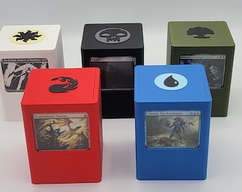 May include: Five colorful card storage boxes. The boxes are red, blue, green, black, and white. Each box has a different symbol on top and a card visible in a window. The cards have fantasy art.