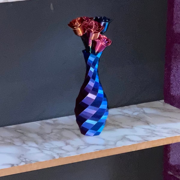 Color changing vase. Multicolored vase; Every side is a different variation of colors; Decorative vase