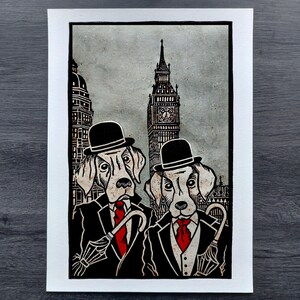 May include: Black and white illustration of two dogs wearing bowler hats and suits, standing in front of Big Ben in London.