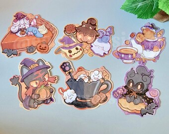 May include: Six die-cut stickers featuring cartoon characters in Halloween themes. Designs include a pumpkin pie, a ghost with a witch hat, a teapot, a cat in a witch hat holding a pumpkin, a teacup with small creatures, and a dark spirit with candy.