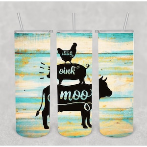 May include: Three stainless steel tumblers with a rustic woodgrain background. The tumblers feature a silhouette of a cow, pig, and chicken stacked on top of each other. The text "moo", "oink", and "click" are written on the tumblers.